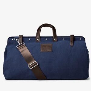 Elegant Navy Duffel Bag with Brown Accents